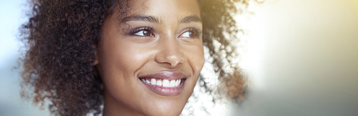 woman who received dental bridges